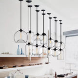 Modern pendant lights with glass shades in a kitchen setting