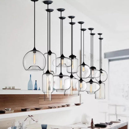 Modern pendant lights with glass shades in a kitchen setting