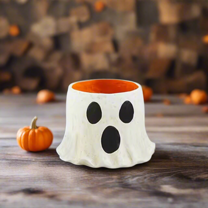 Halloween ghost-shaped candy bucket with dimensions on a white background