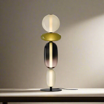Table lamp with four spherical heads and dimensions labeled on a white background


