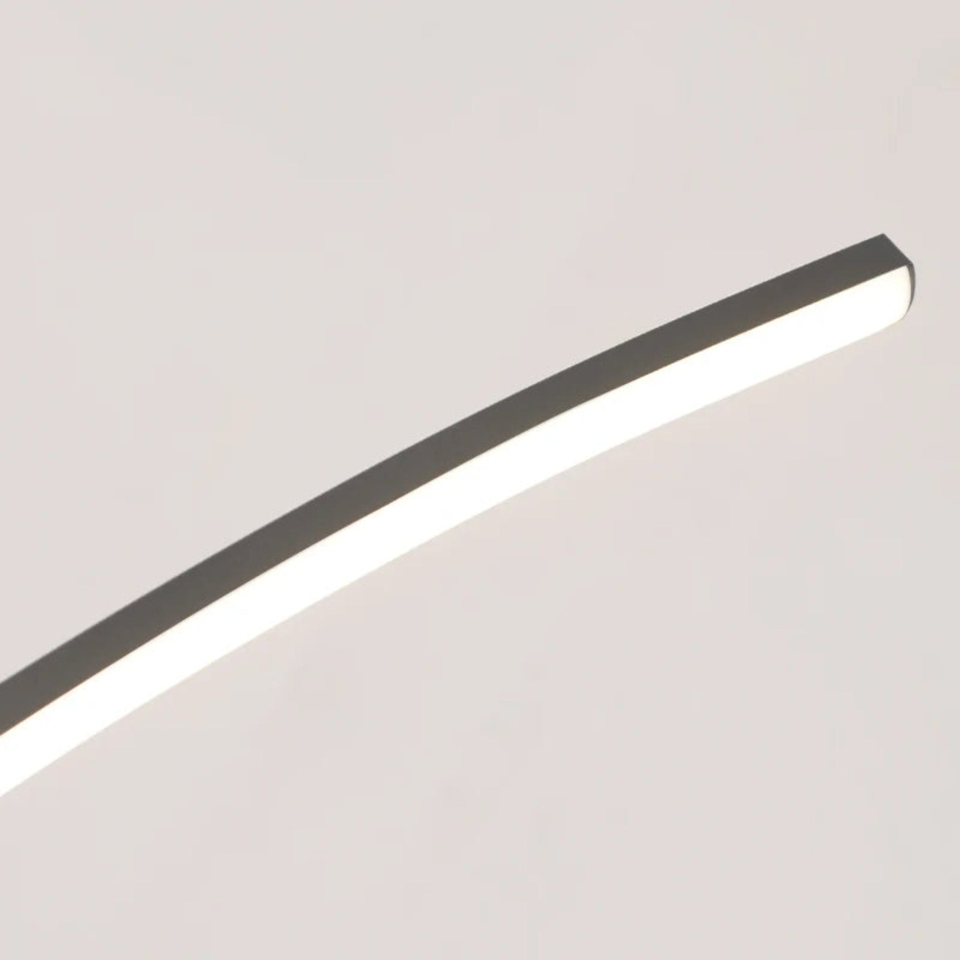 Modern ceiling light fixture on a neutral background