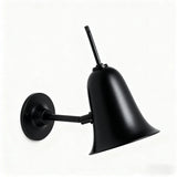 Black wall-mounted lamp on a white background