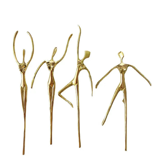 Set of four gold abstract sculptures on a white background
