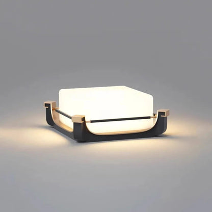 Modern wall light fixture on a gray background