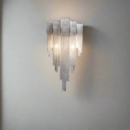 Decorative wall light fixture with dimensions on a black background