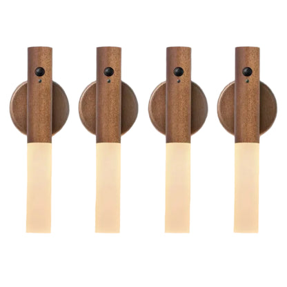 Four wooden wall sconces with light bulbs on a gray background