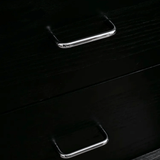 Two silver handle on a dark wooden surface