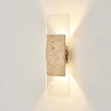 Square wall light fixture on a white wall