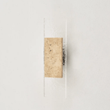 Rectangular block with textured surface on a white background