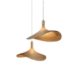 Two woven pendant lights on a white background