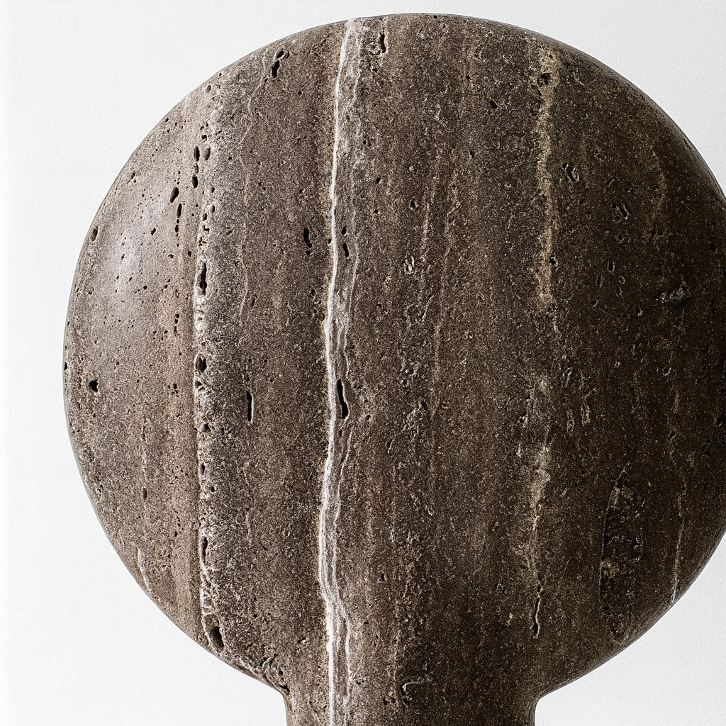 Close-up of a textured stone object on a white background