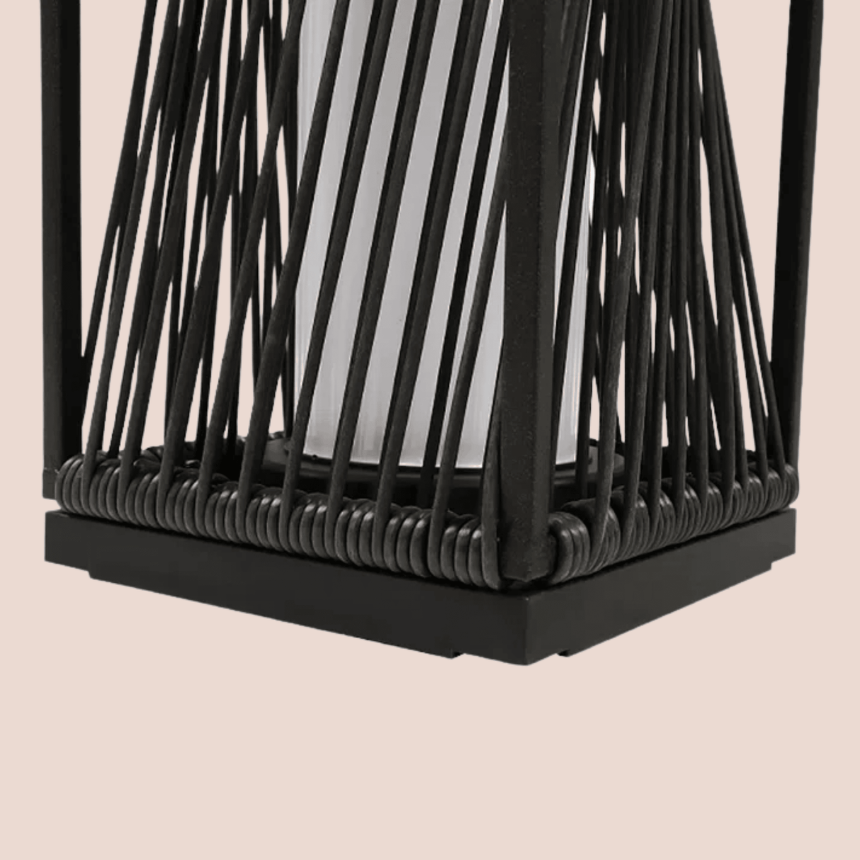 Black woven lantern on a beige background