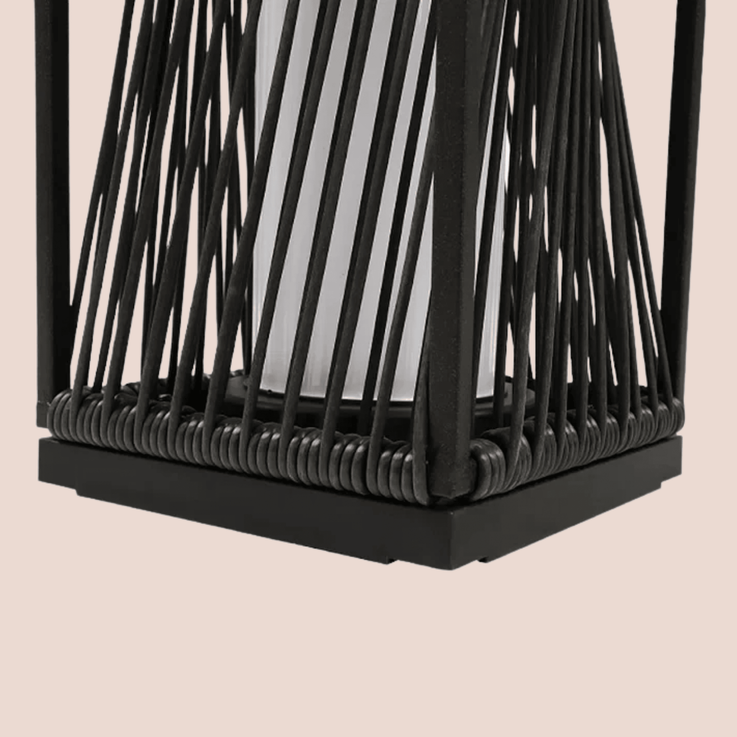 Black woven lantern on a beige background