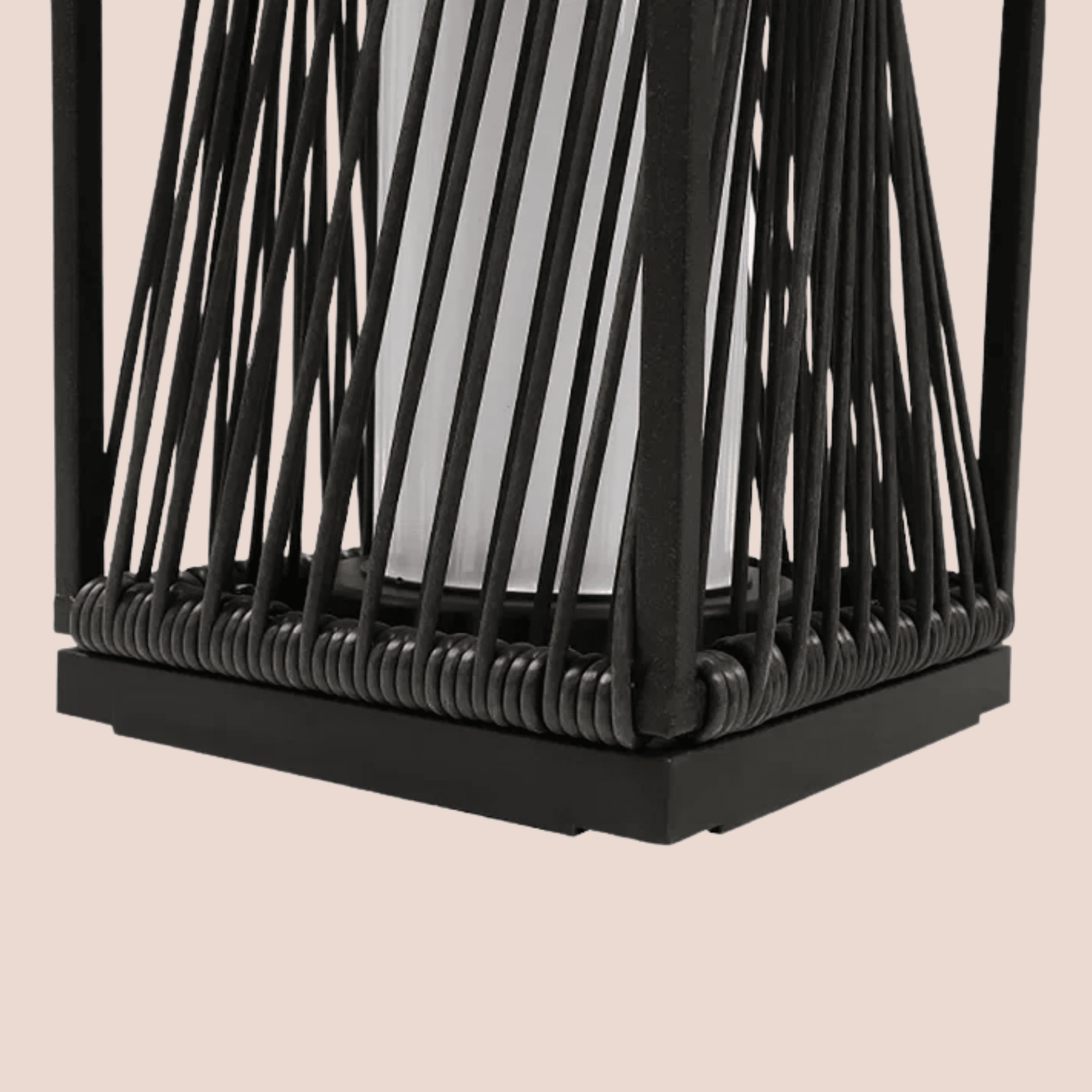 Black woven lantern on a beige background