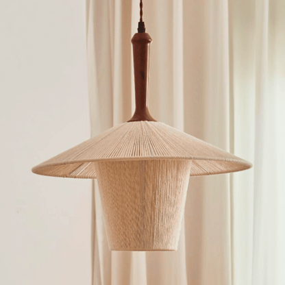 Wooden pendant lamp with a natural finish against a neutral background