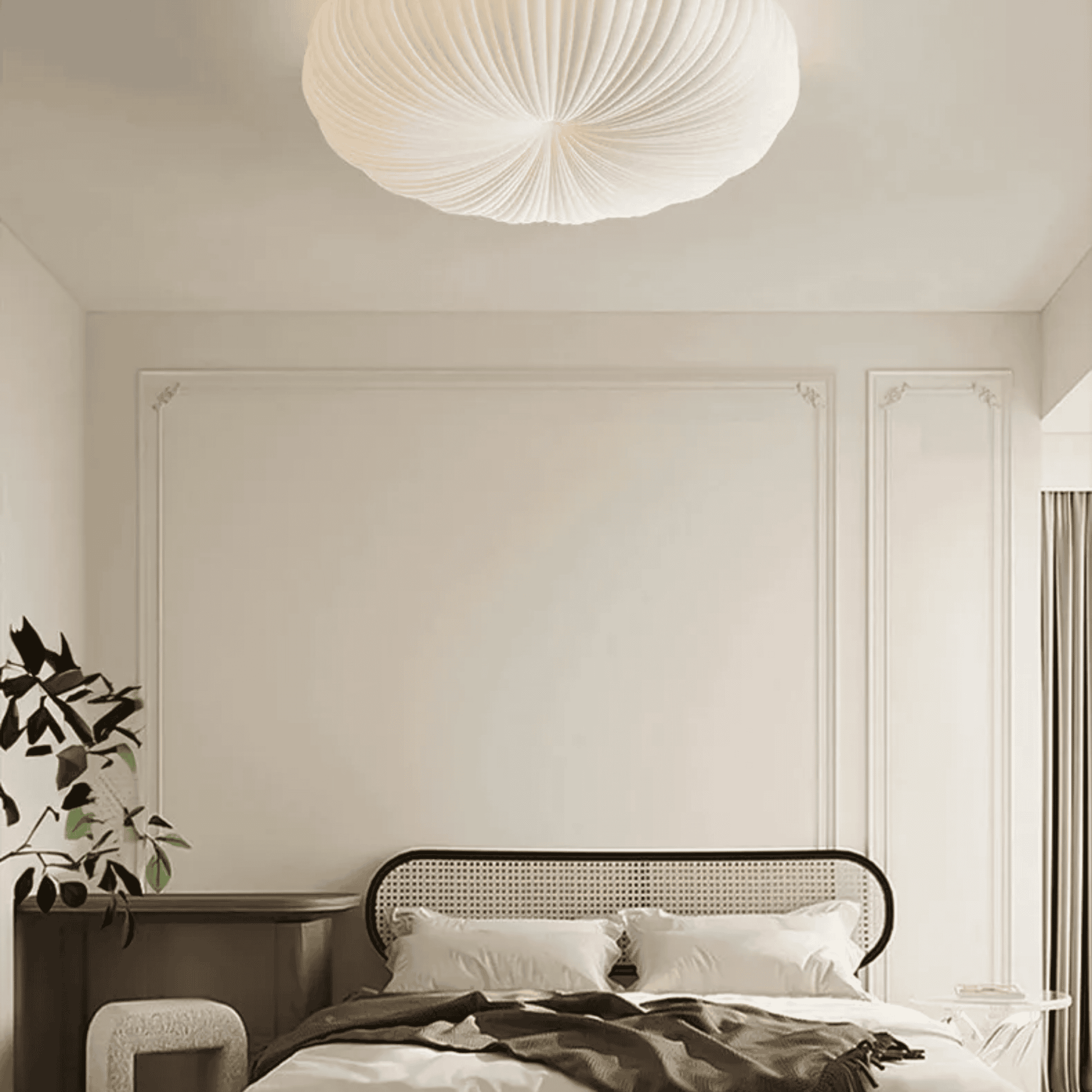 Modern bedroom with a bed, nightstand, and decorative light fixture.