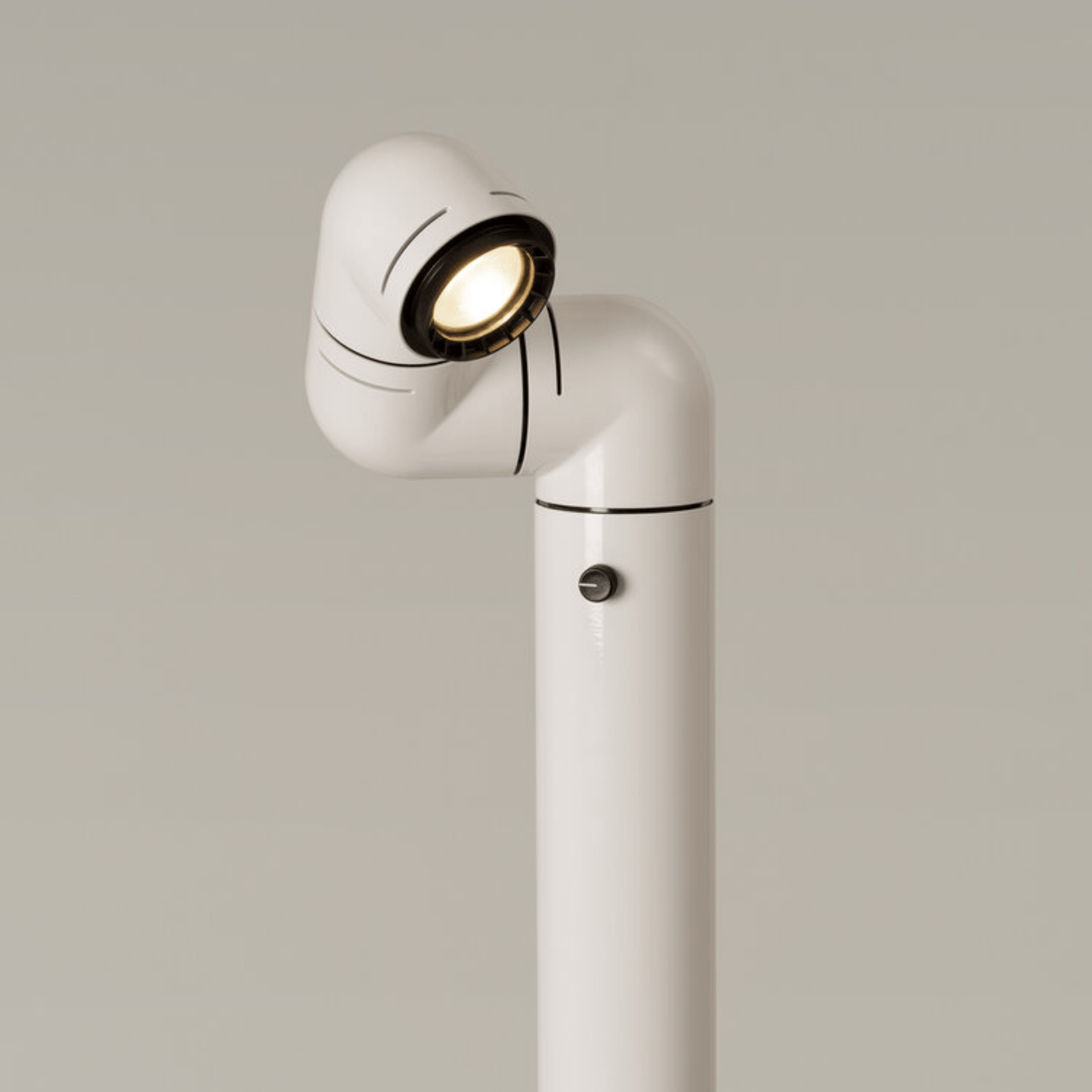 White floor lamp with a spotlight on a neutral background