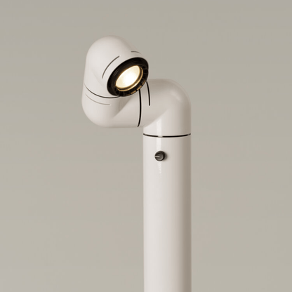 White floor lamp with a spotlight on a neutral background