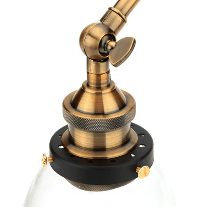 Brass lampshade finial on a white background