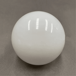 White sphere on a gray background