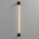 Modern wall-mounted light fixture on a gray background