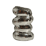 Decorative vase with a silver, mosaic-like finish on a white background