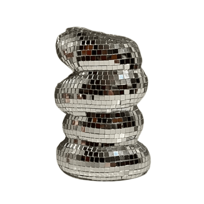 Decorative vase with a silver, mosaic-like finish on a white background