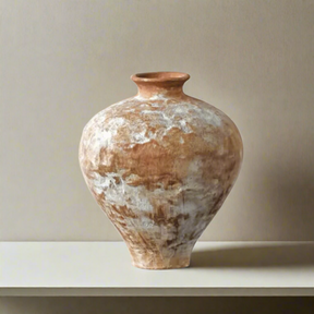 Vintage-style terracotta vase on a white background