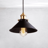 Black pendant light with gold fixture on a white background