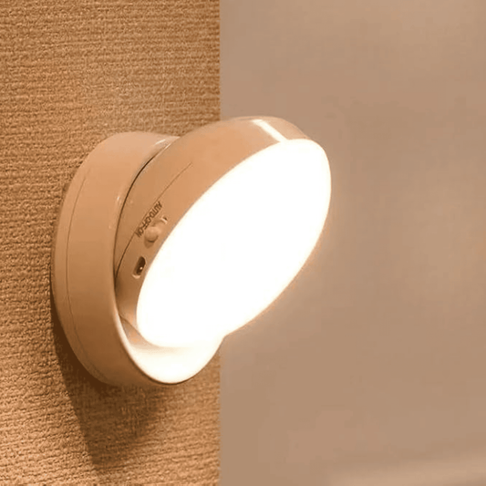 Beige night light attached to a textured wall