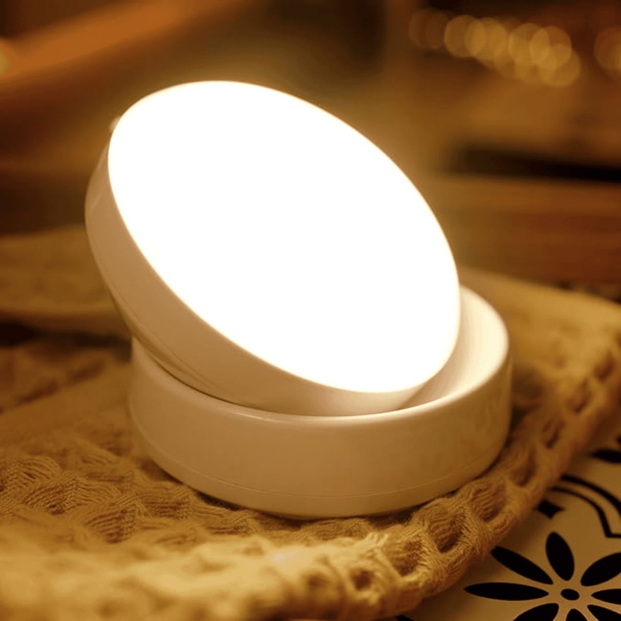 White night light on a textured surface with a warm glow