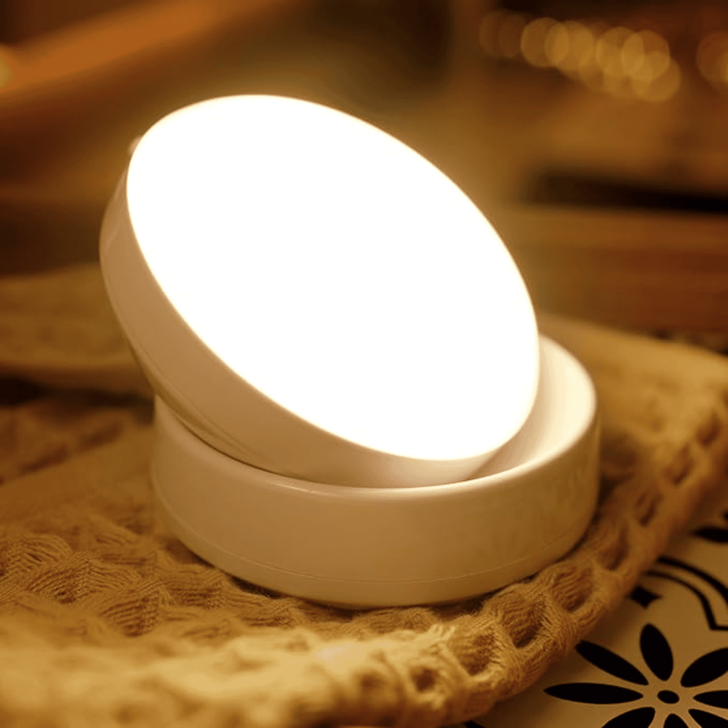 White night light on a textured surface with a warm glow