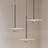 Modern pendant lights hanging against a neutral background