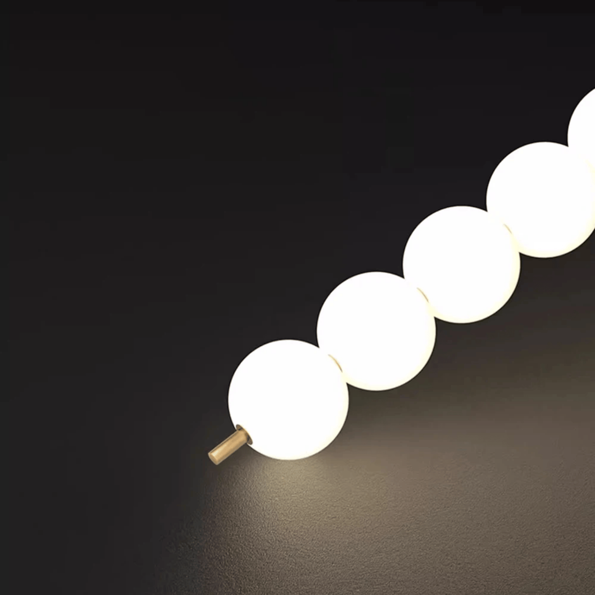 String of light bulbs on a dark background