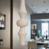 Beige textured vase on a white background