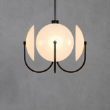 Modern pendant light with glass shade on a gray background