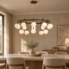 Marble ball light – 100cm Black – lifestyle Installed above dining table in elegant warm beige dining room, ceiling connection visible, exact scale relative normal furniture.