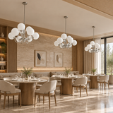 Chrome glass chandelier – 9 heads Chrome – multiple fixtures THREE identical NINE-globe chrome pendants installed at even intervals over separate tables in spacious elegant restaurant, all same70cm diameter and exact original curved arms, full room photo.