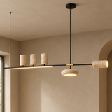 Front close-up of Cavelle pendant cave-stone shades and brass connector