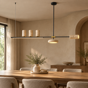 Cavelle natural stone 120 cm five-head linear pendant above a warm modern dining table