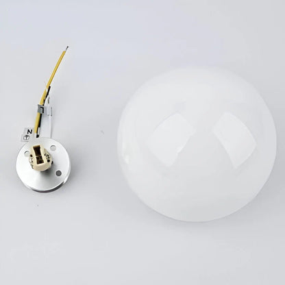 Light bulb socket and glass cover on a white background