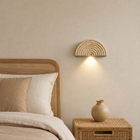 Kaeva Wabi-Sabi yellow stone wall sconce in the downward orientation