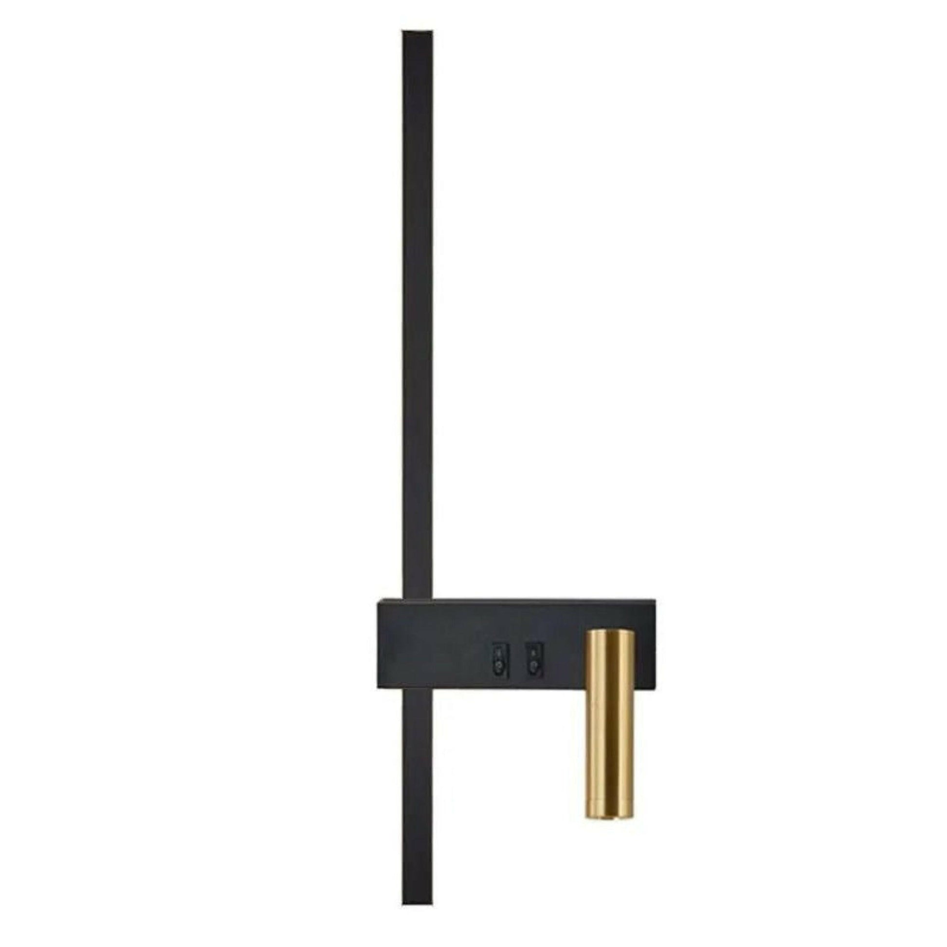 Black and gold wall-mounted clock with a long thin arm on a white background