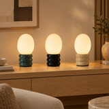 Green black and yellow travertine egg-shaped table lamp variants together