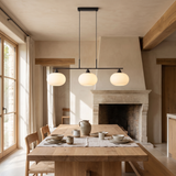 Nordic Linear Globe Chandelier – black 3-head – dining-room lifestyle