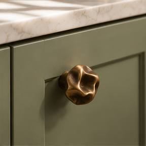 Ondara Sculpted Knob – Antique Bronze – Sage cabinet lifestyle