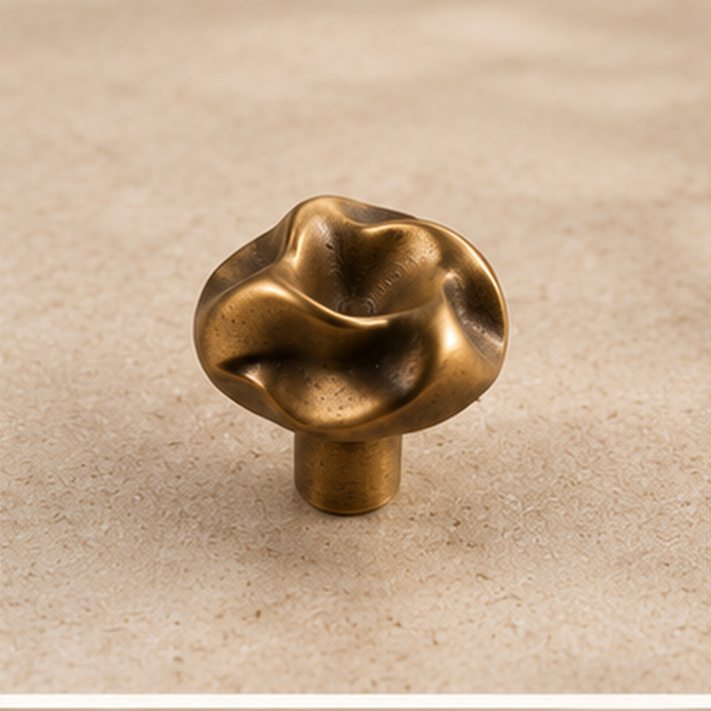Ondara Sculpted Knob – Antique Bronze – Beige studio product
