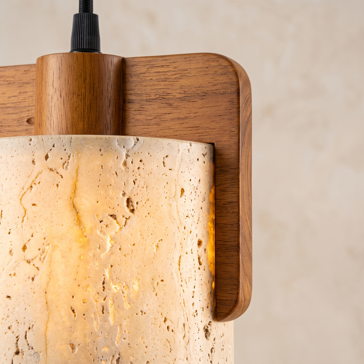 Orlena Cove pendant close-up showing travertine texture and wood grain