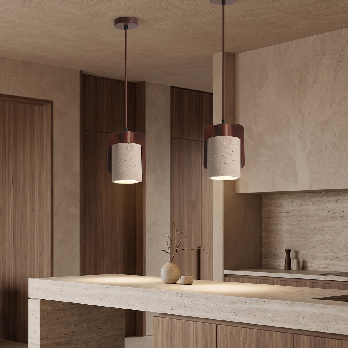 Two Orlena Pillar pendant lights above a refined stone counter