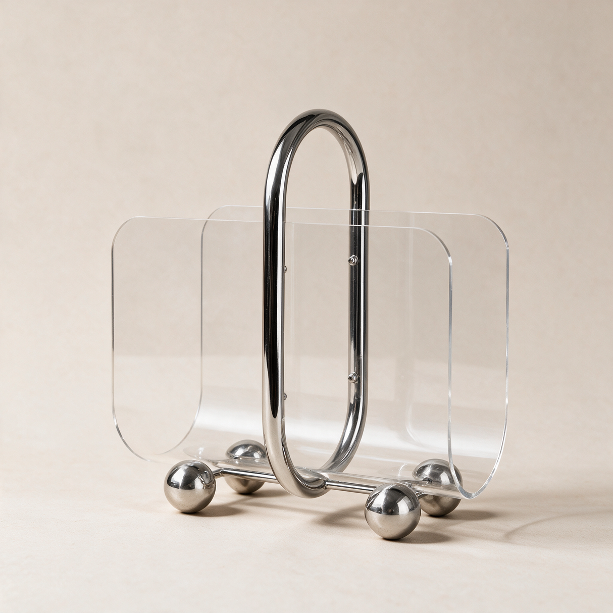 Modern 28 x 15 x 31.5 cm metal and acrylic portable bookcase on a clean warm beige background